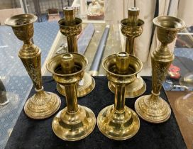 THREE PAIRS OF BRASS CANDLESTICKS