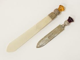 TWO LETTER OPENERS IN STERLING SILVER WITH STONES TO TOP