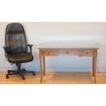 An early 20th century French mahogany desk and applied gilt metal highlights, with a single frieze