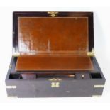 A Victorian mahogany & brass bound writing slope, opening to reveal fitted interior with inset