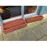 Three terracotta garden troughs. W89cm, H19cm, D16cm. (3)