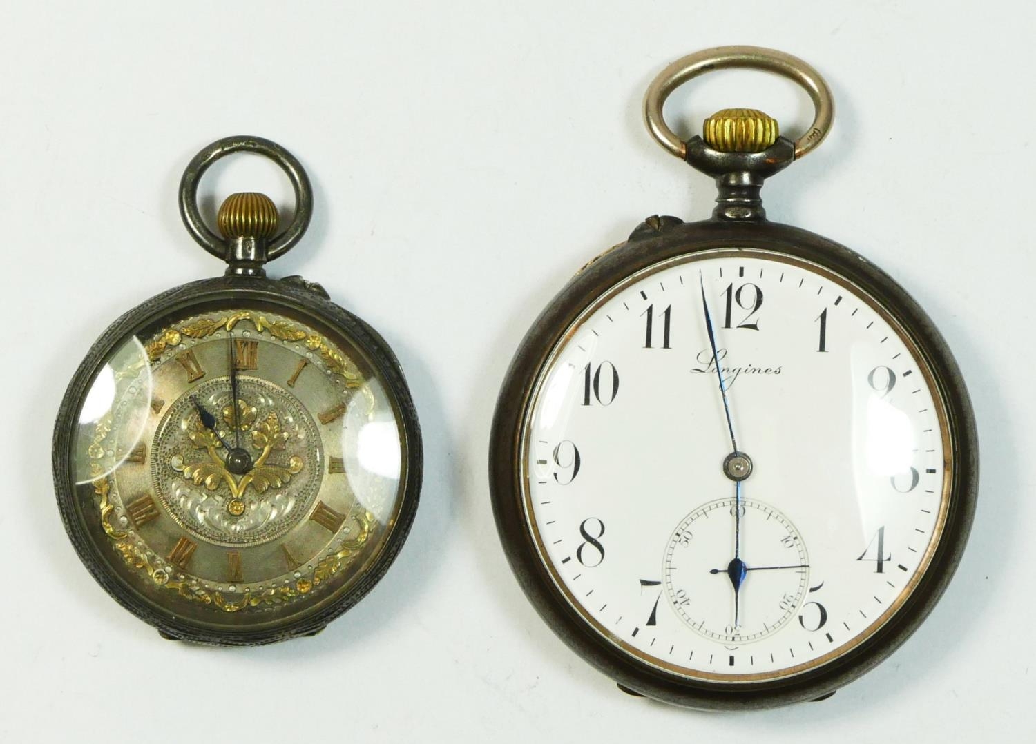 Longines, a gun metal key less wind open face pocket watch, signed movement numbered 2784617 and a