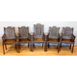 A late 19/early 20th century carved hardwood set of five dragon chairs, possibly Burmese, the back