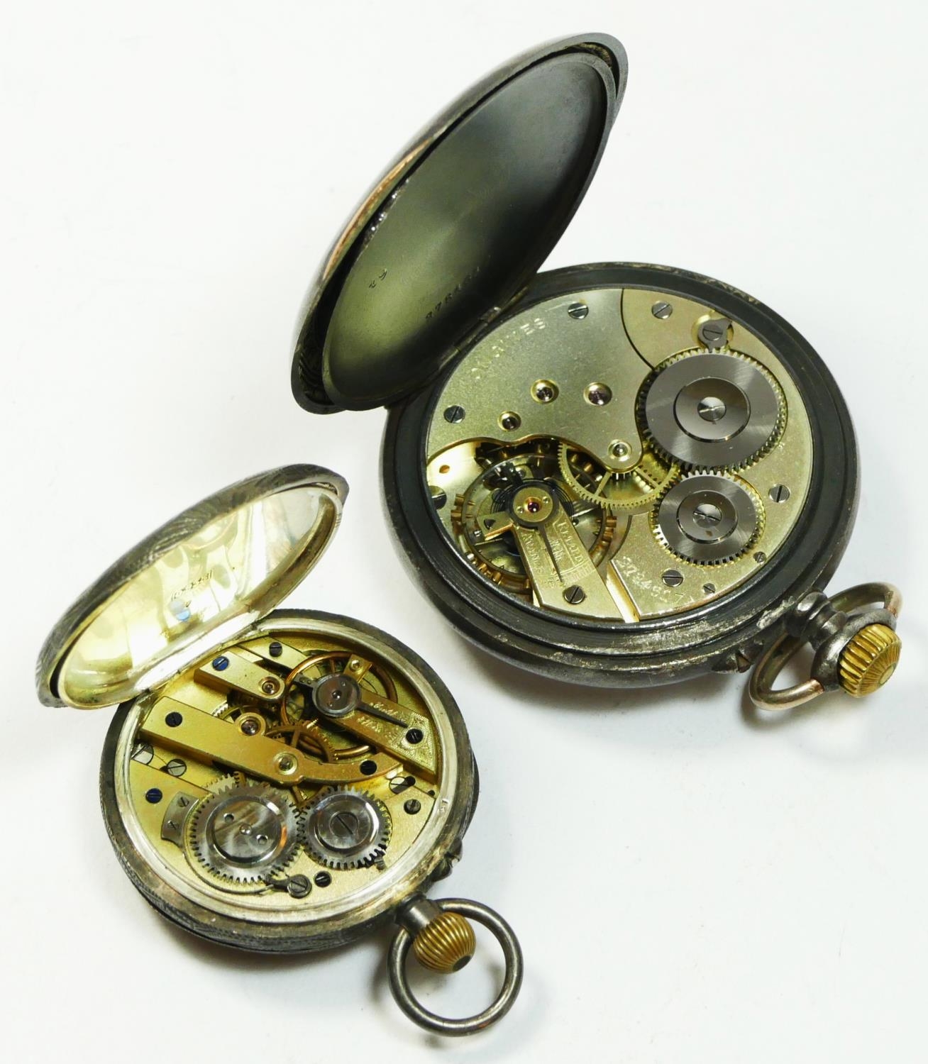 Longines, a gun metal key less wind open face pocket watch, signed movement numbered 2784617 and a - Image 2 of 3