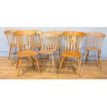 A harlequin set of 8 pine dining chairs (8)