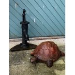 A cast iron pitcher pump water feature, 65cm tall, together with a large terracotta garden