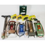 A Spinx hand pull tyre pump, a Sutty foot pump, a Duco foot pump, A British Goodrich foot pump and a