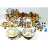 WITHDRAWN A collection of child related figurines, collector plates, models, books, framed teddy