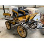 Cumbria Carriages Driving School six person Cart, offered in yellow with 27 inches wheels, front and
