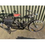 A Flying Pigeon motorised bicycle, unregistered, with luggage rack, pannier and rear stand. The