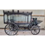 c.1970's horse drawn hearse, unknown manufacture, with etched glass panels, shafts, coach lamps, a