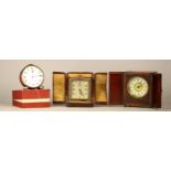 Three early 20th century traveling alarm clocks, comprising of a French 'Jaz' silver plated