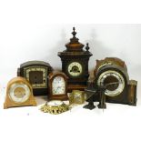 A collection of early 20th century and later mantel clock, having manual and quartz movements. (4)