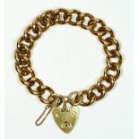 A 9ct gold solid curb link bracelet, with padlock clasp, Birmingham 1989, 61.6gm