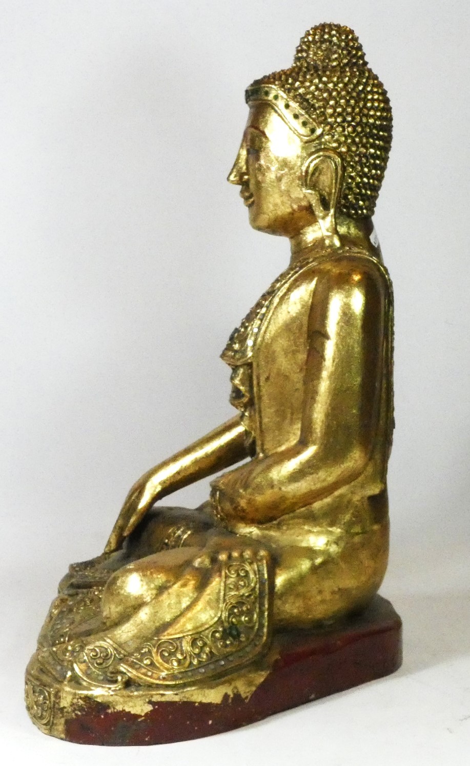 A seated carved wood Buddha, finely carved gilt scrollwork costume and headdress with inset glass - Image 3 of 3