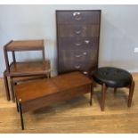 A mid 20th century Sherborne footstool, having padded black leatherette circular top raised on