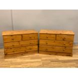 A matching pair of drawers, stained pine, two small drawers over two long, button handles, 94cm x