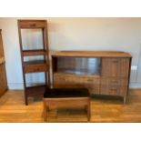 A mid 20th century teak sideboard, comprising of rectangular top above a fall front cupboard,