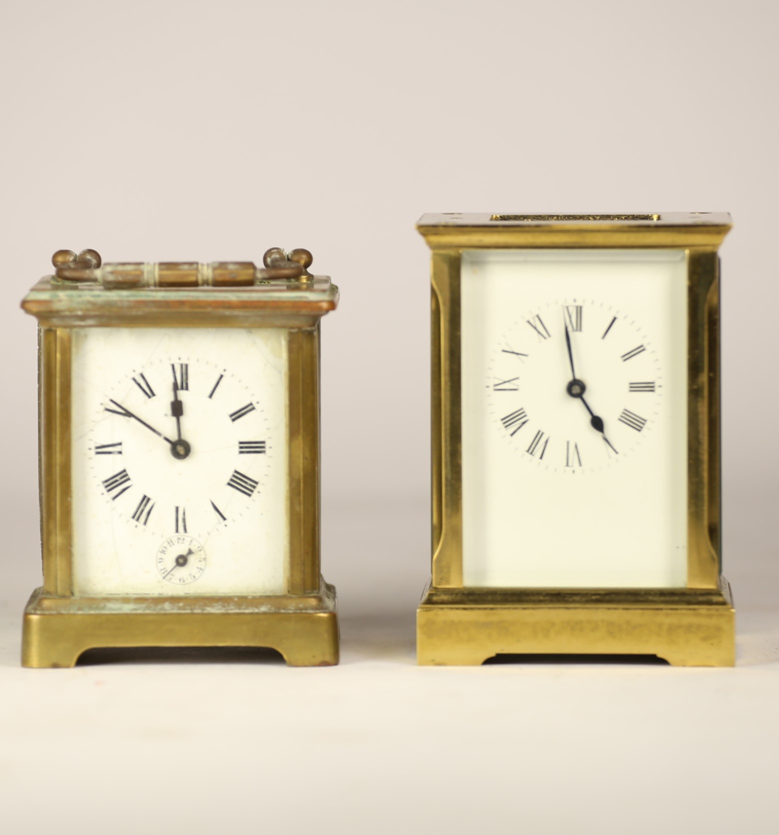 Two mid 20th century brass carriage clocks, with 8 day movements. (at fault)