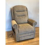 A electrical recliner armchair, upholstered in a grey coloured chenice fabric, with power lead and