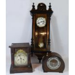 A Vienna style 8 day wall clock, having brass bezel and enamelled dial with Roman numerals, movement