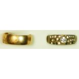 A 9ct gold wedding band, 4,5gm, R and a paste set ring.