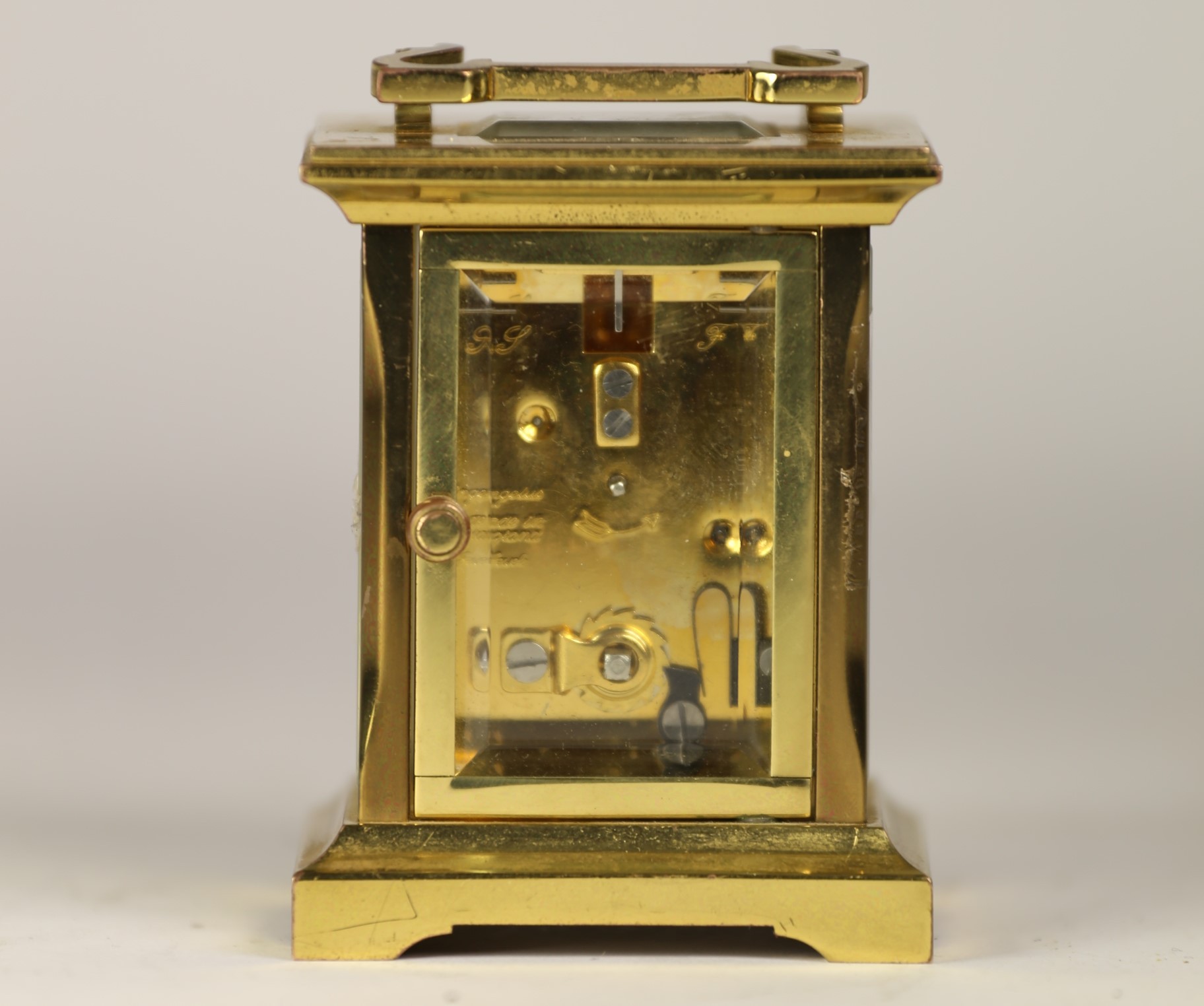 An English miniature brass carriage clock, having enamelled dial with Roman numerals, 8 day jewelled - Image 2 of 2