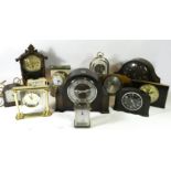 A collection of manual wind and quartz mantel clocks, makers to include - Smiths, Elliott and