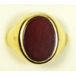 A 9ct gold and cornelian gentleman's signet ring, T, 9gm
