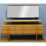 A mid-century Schreiber dressing table, an adjustable mirror over a floating shelf over 2 rows of