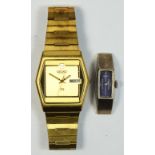 Seiko quartz, a gold plated day/date gentleman's wristwatch, ref 8123-507L D, case number 290253,