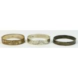 Three silver hinged bangles, Birmingham 1975, 76, 78, all with engraved decoration, 83gm