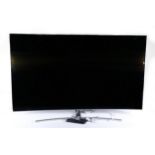 A Samsung 55 inch curved TV, model number QE55 Q8CAMT XXU, with AC power lead, 'one connect' lead