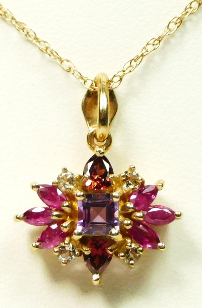 A 9ct gold gemset cluster pendant, set with ruby, garnet, amethyst and a clear stone, chain, 2.7gm