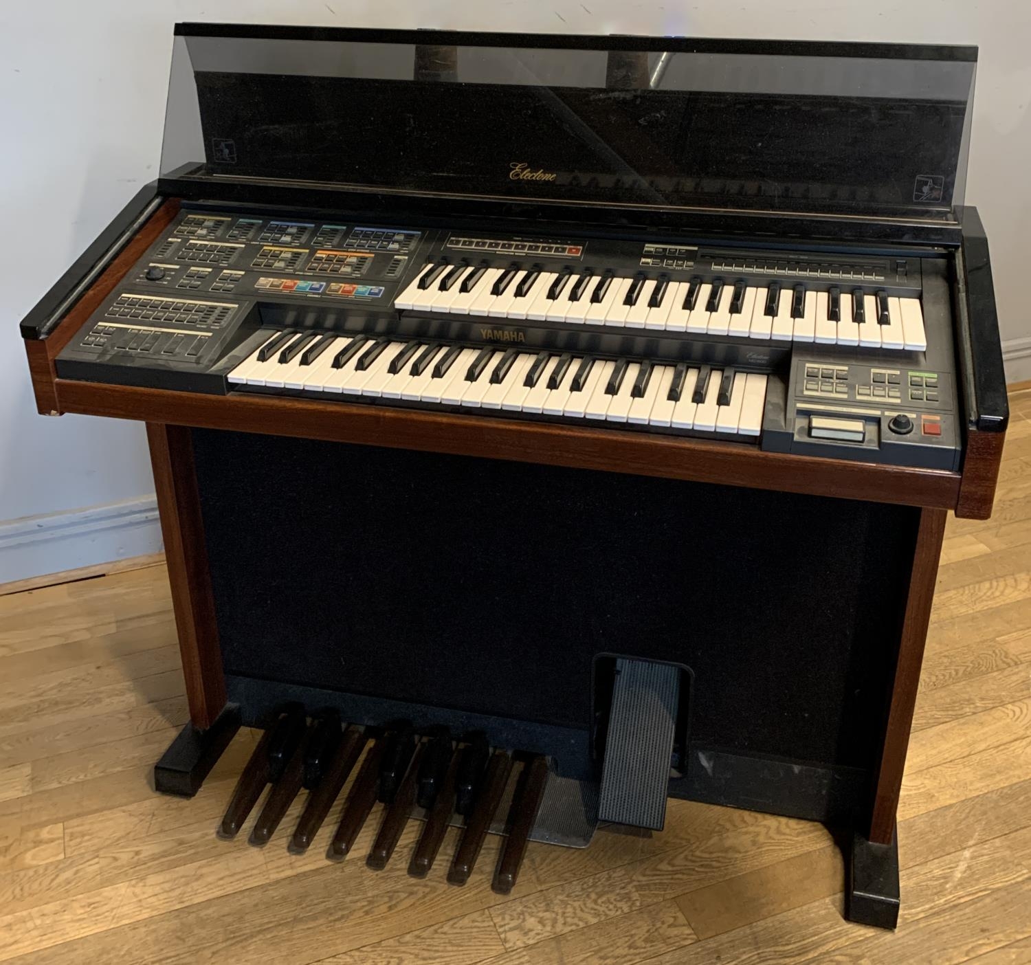 A Yamaha Electone organ, 108cm x 90cm x 45cm