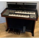 A Yamaha Electone organ, 108cm x 90cm x 45cm