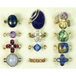 Twelve silver and gemstone set rings, 63gm