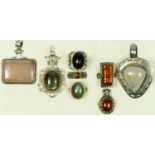 Eight silver and semi precious gemstone set rings and pendants, 100gm.