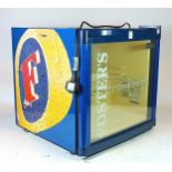 A Husky counter top beer cooler advertising 'Fosters lager', w50 h50, d50cm.