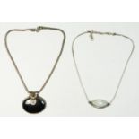 A silver and haematite large pendant, snake chain, and a silver and gemstone pendant, 109gm