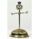An Edwardian electroplated hat pin and ring tree, with thistle surmount, 11cm