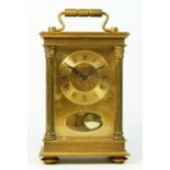 A West German brass carriage clock, having 8 day pendulum movement striking on bell. 19cm tall.
