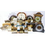 A collection of carriage clocks, wall clocks and alarm clocks, having manual wind and quartz