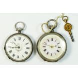 A Swiss silver ladies open face key wind pocket watch, working but not guaranteed and another,