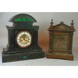 A late 19th century slate mantel clock, the enamel dial with Arabic numerals with open escapement,