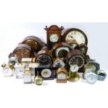 A collection of carriage clocks, anniversary clocks and mantel clocks, having manual wind and quartz