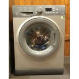 A Hotpoint 'Smart Tech' washing machine, model WMFUG 742. W60, H85, D53cm