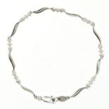 A 9ct white gold and diamond set bracelet, 19cm, 2.7gm