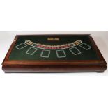 A five in one games table, wood framed with felt matts, including the games black jack, roulette,