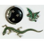 A 925 silver, green enamel and marcasite dragon brooch, a 925 silver green paste and marcasite